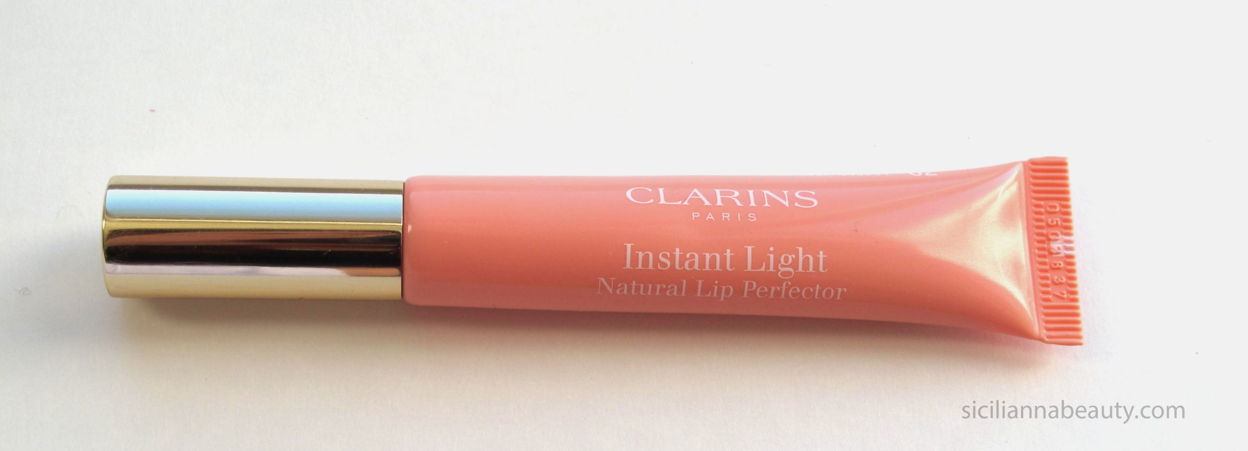 Review Clarins Instant Light Natural Lip Perfectorslashes And Lipstick Beauty Bar